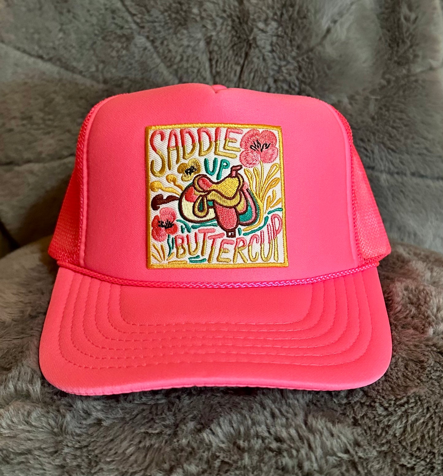SADDLE UP BUTTERCUP TRUCKER CAP