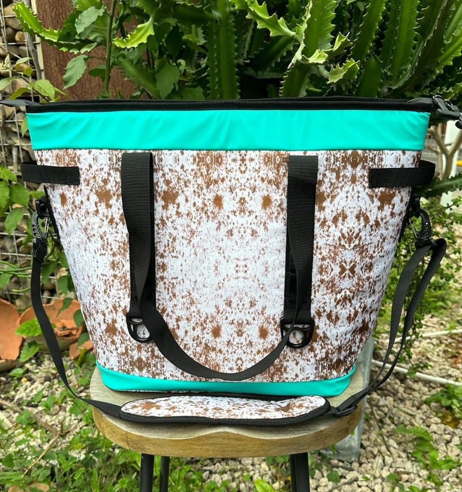 COW PRINT WITH TEAL TRIM COOLERS - CountryFide Custom Accessories and Outdoors