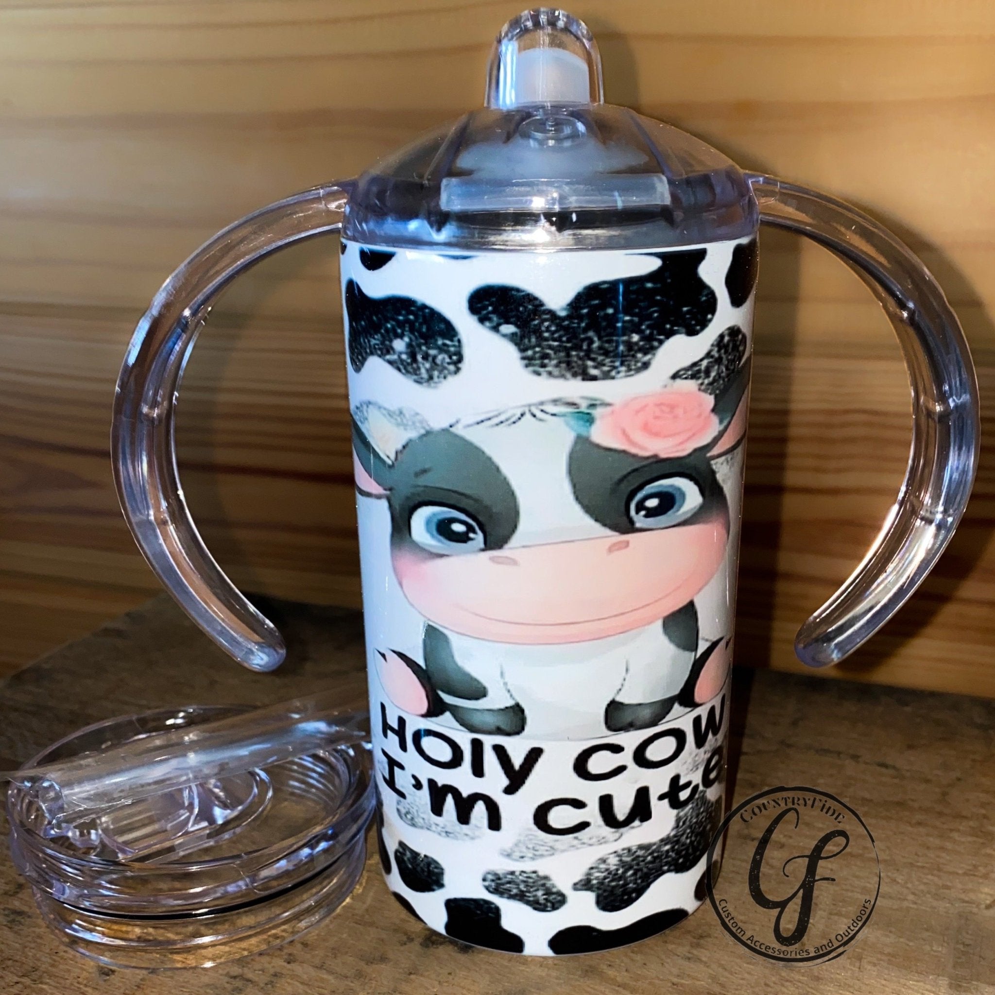 http://countryfidecustomaccessoriesandoutdoors.com/cdn/shop/products/holy-cow-im-cute-sippy-cup-454740.jpg?v=1690980650