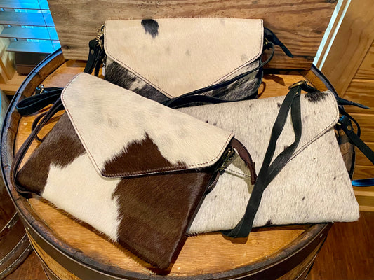 OUT ON THE TOWN COWHIDE WRISTLET/CROSSBODY