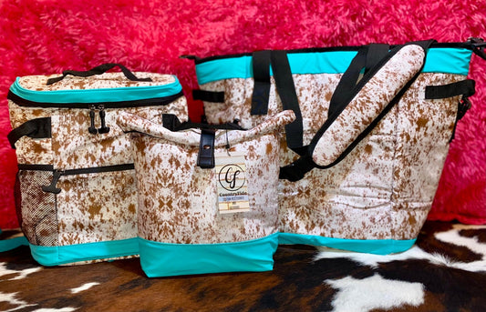 COW PRINT WITH TEAL TRIM COOLERS - CountryFide Custom Accessories and Outdoors